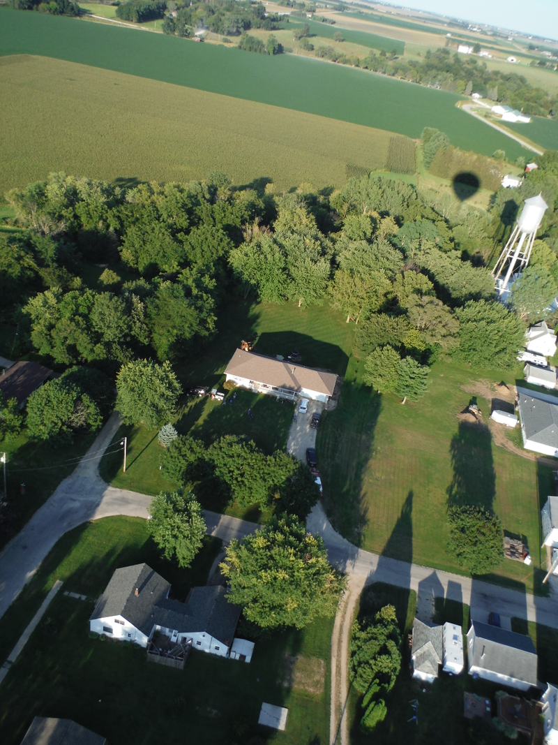 Sorry, this one’s showing up sideways in my edit view—hopefully it straightens out when I publish. But you can see the shadow of the balloon near the water tower!